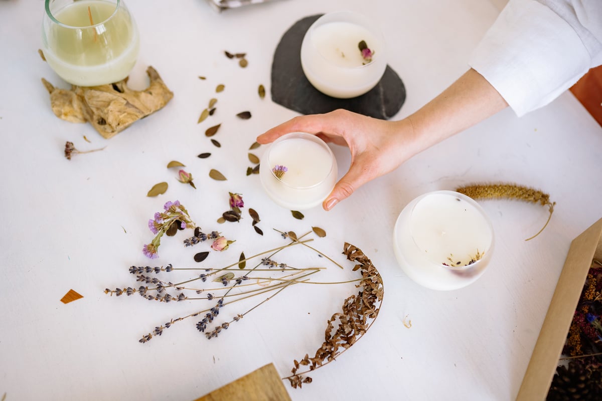 Person Making Artisan Candles